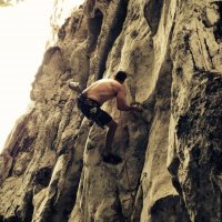 Simon Wilson tries his signature move at the crux of Chuck Norris